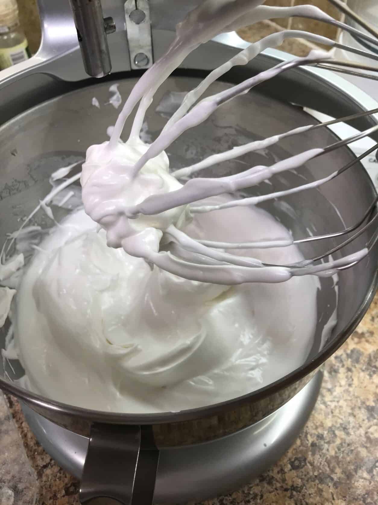thick egg whites in the bowl of a stand mixer