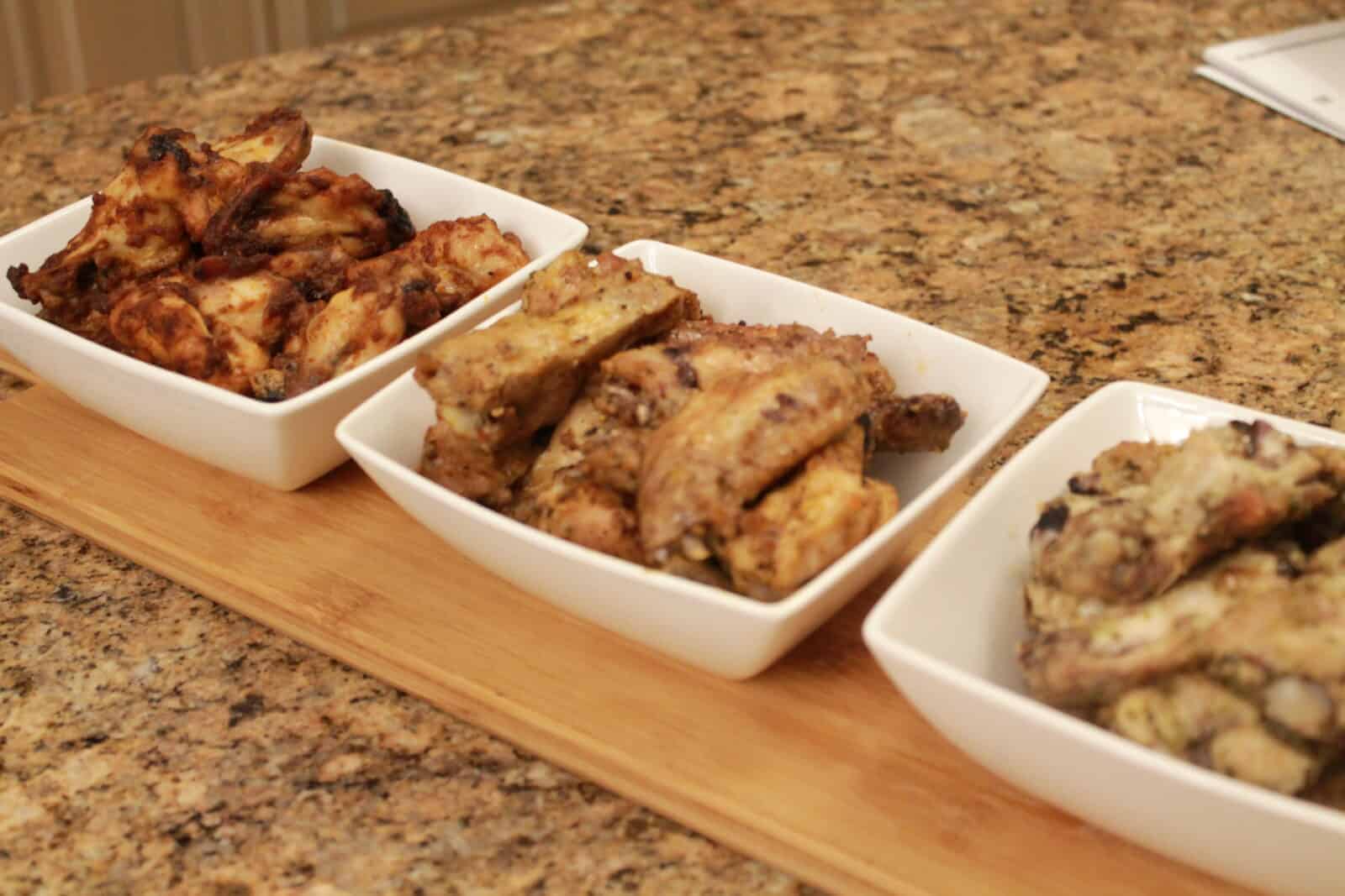 chicken wings in a 3 bowls