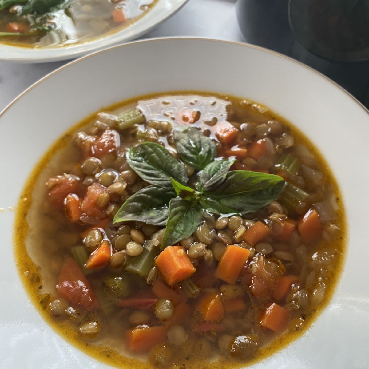 Lentil and Carrot Soup in a White Plate