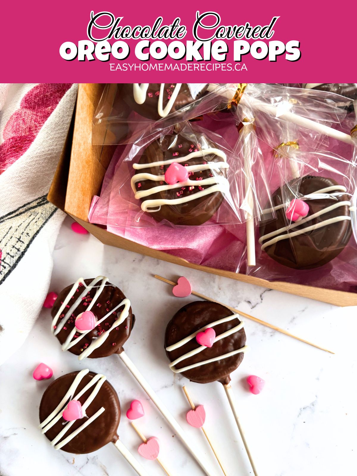 cookie pops on the counter next to packaged cookie pops PIN