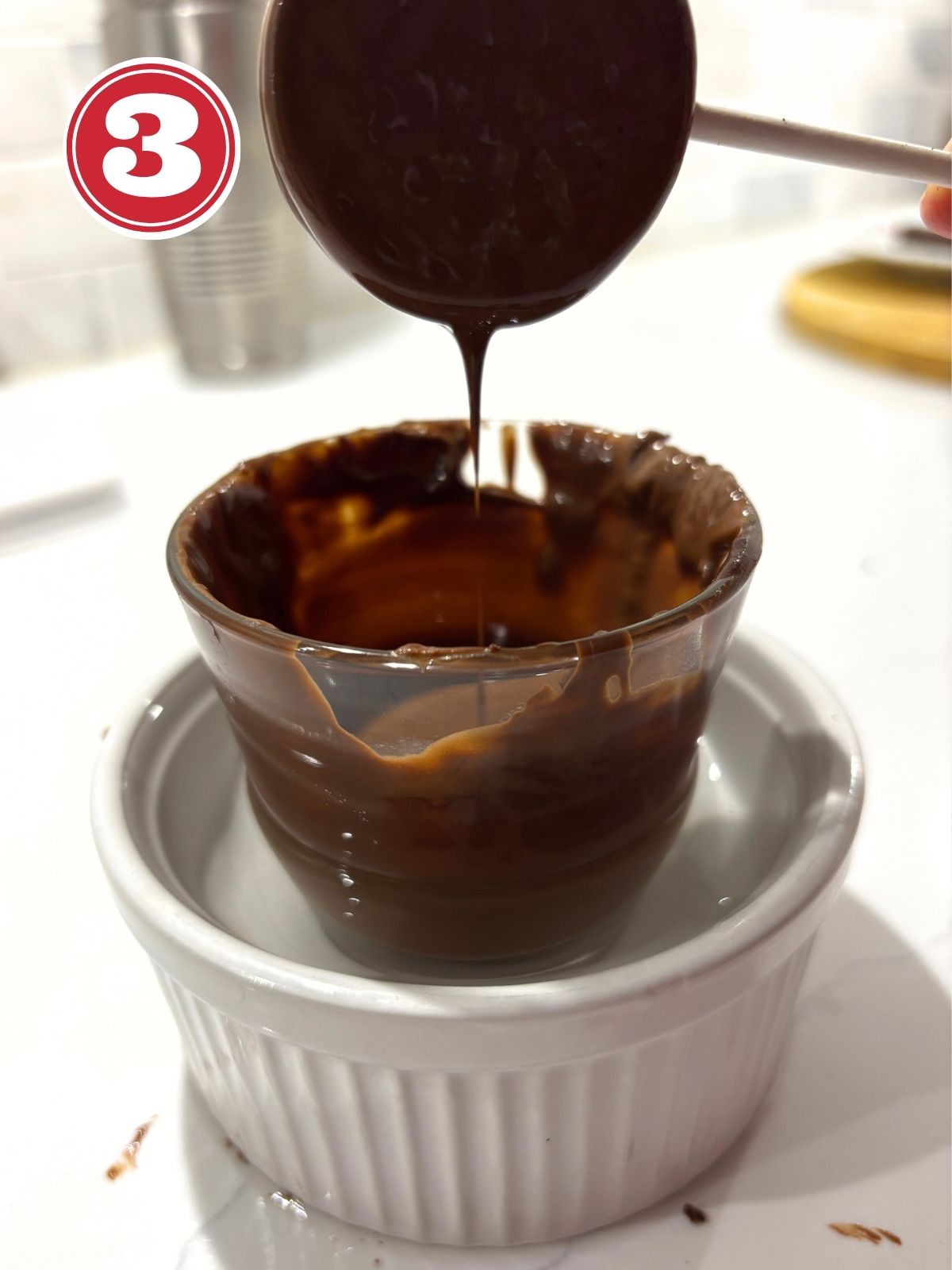 dipping cookies in melted chocolate