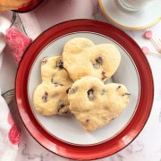 3 Cranberry orange cookies in a white plate