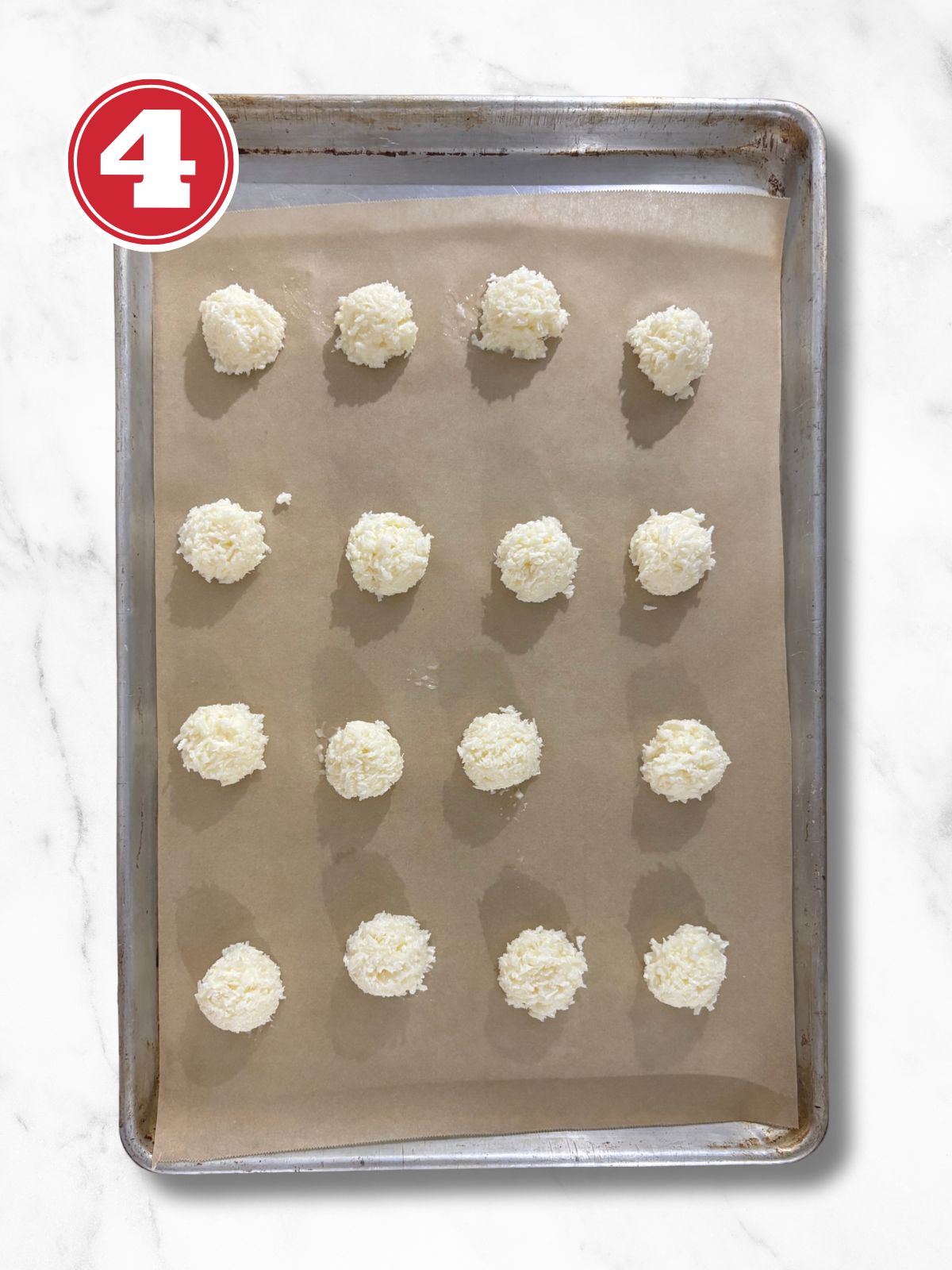 coconut macaroons on a baking sheet lined with parchment paper