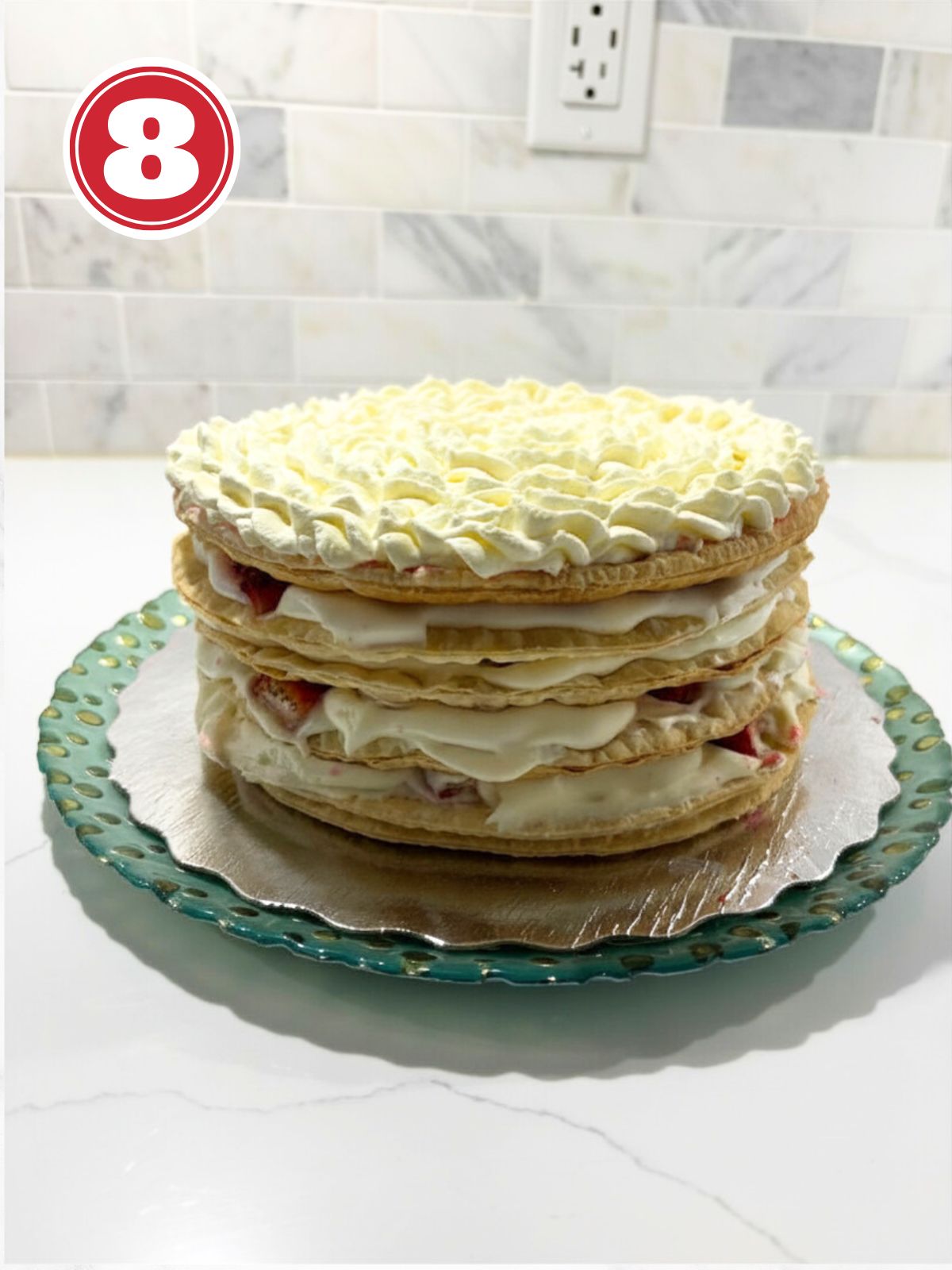 puff pastry layers cream and strawberry filled with top icing layer