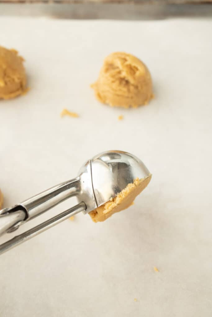 scooping cookie dough