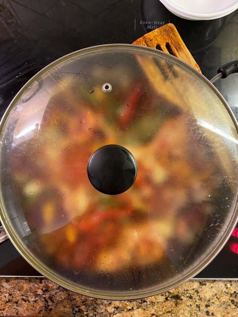 Chicken Cacciatore in a skillet covered