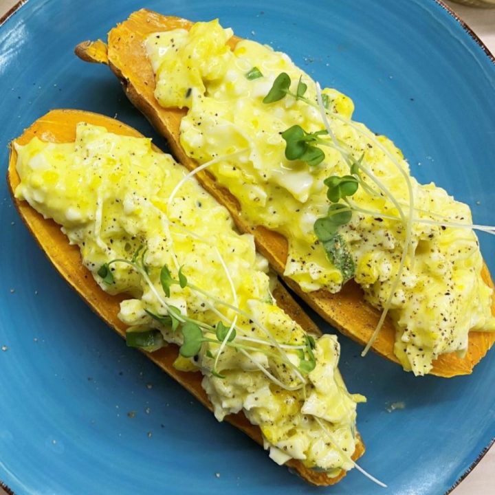 Egg Salad Sweet Potato Boats in a blue plate