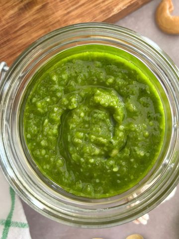Dairy free pesto sauce in a mini jar