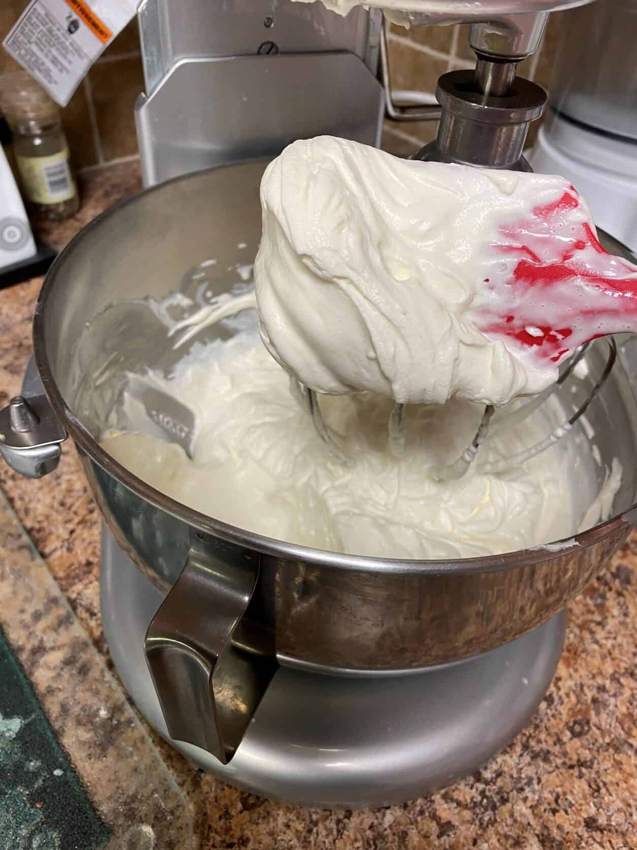 whipped Cream cheese and powdered sugar in a mixing bowl