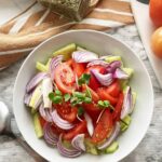 Mediterranean Tomato and Cucumber Salad in a White Bowl