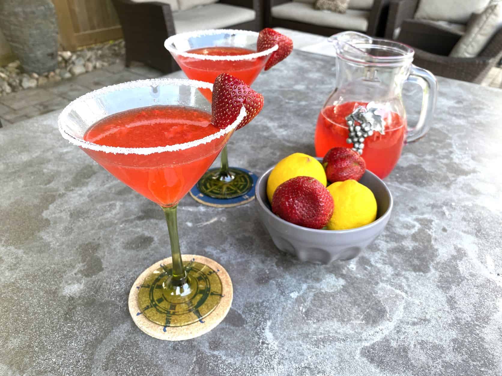 Strawberry Lemonade with Vodka in martini glasses