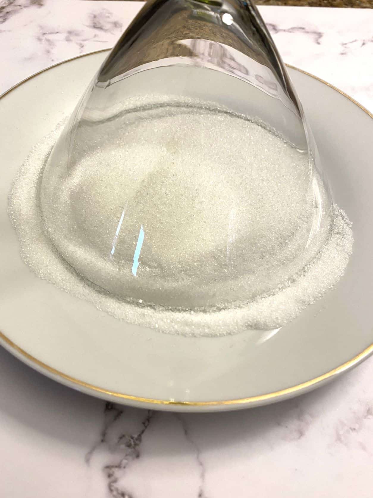 creating sugar rim around martini glass