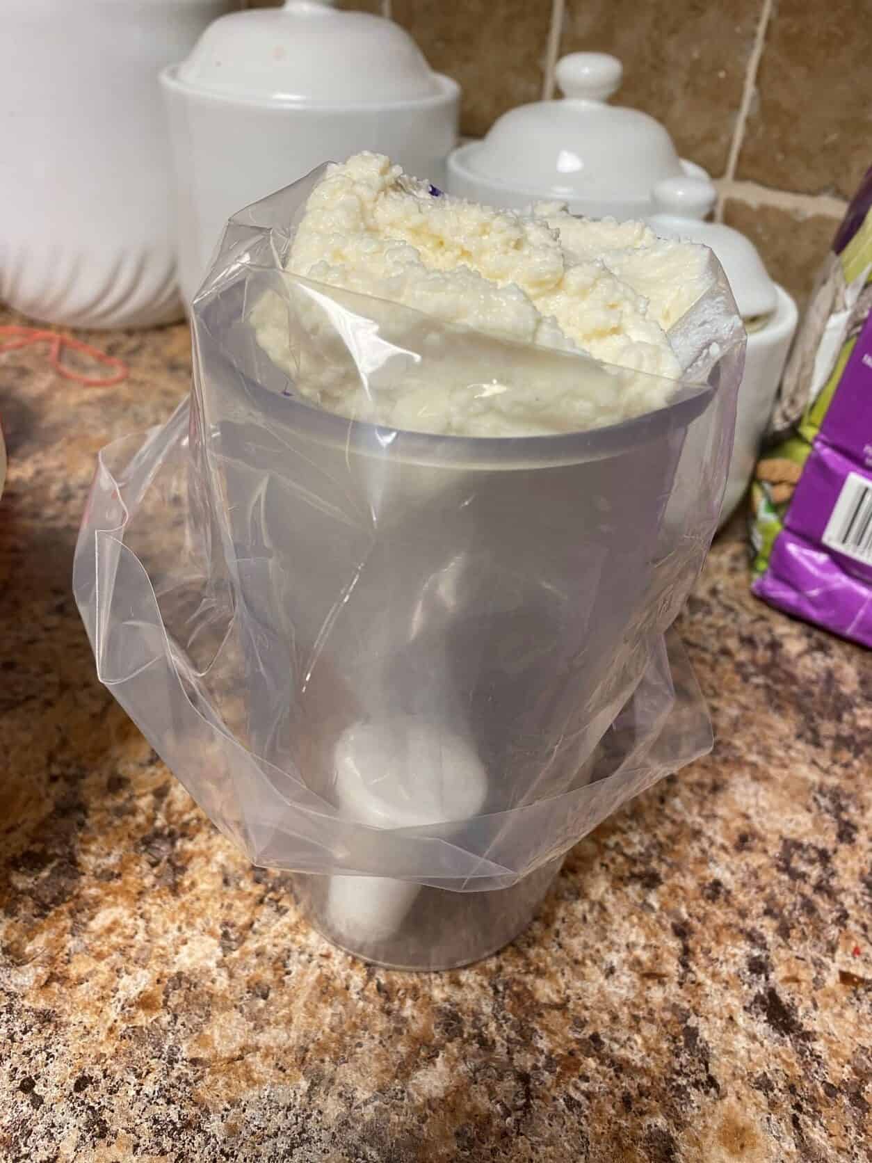 Ricotta Cheese filling in a piping bag
