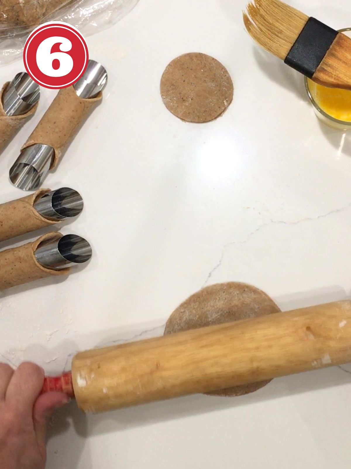 rolling cannoli dough in to circle