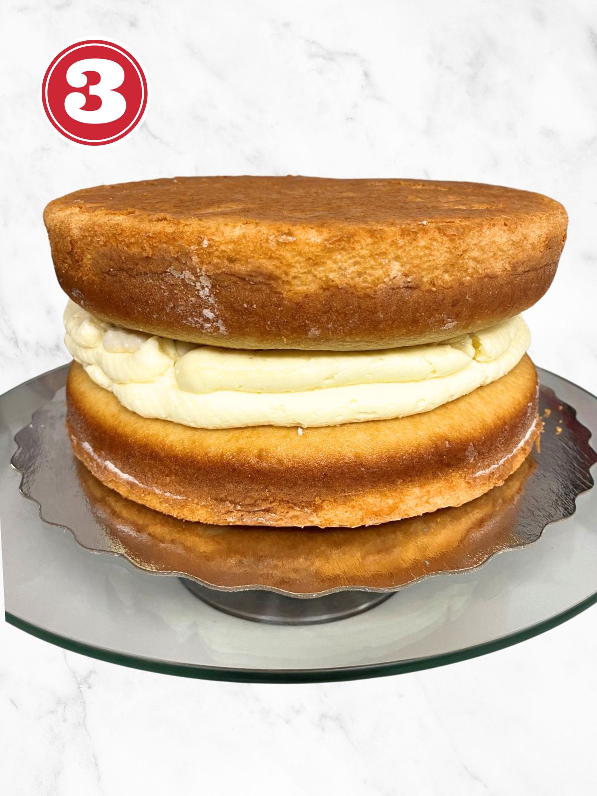 cake layers with cannoli filling in the middle