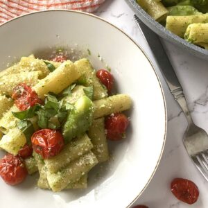 Pasta with Broccoli and Cherry Tomatoes in a white plate