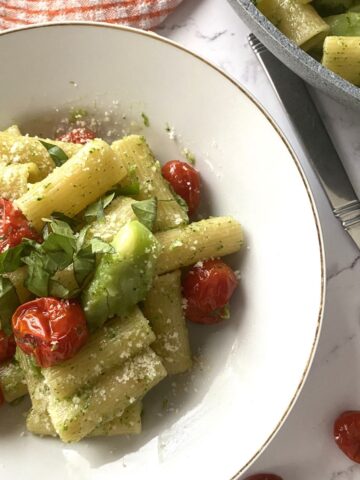 Pasta with Broccoli and Cherry Tomatoes in a white plate