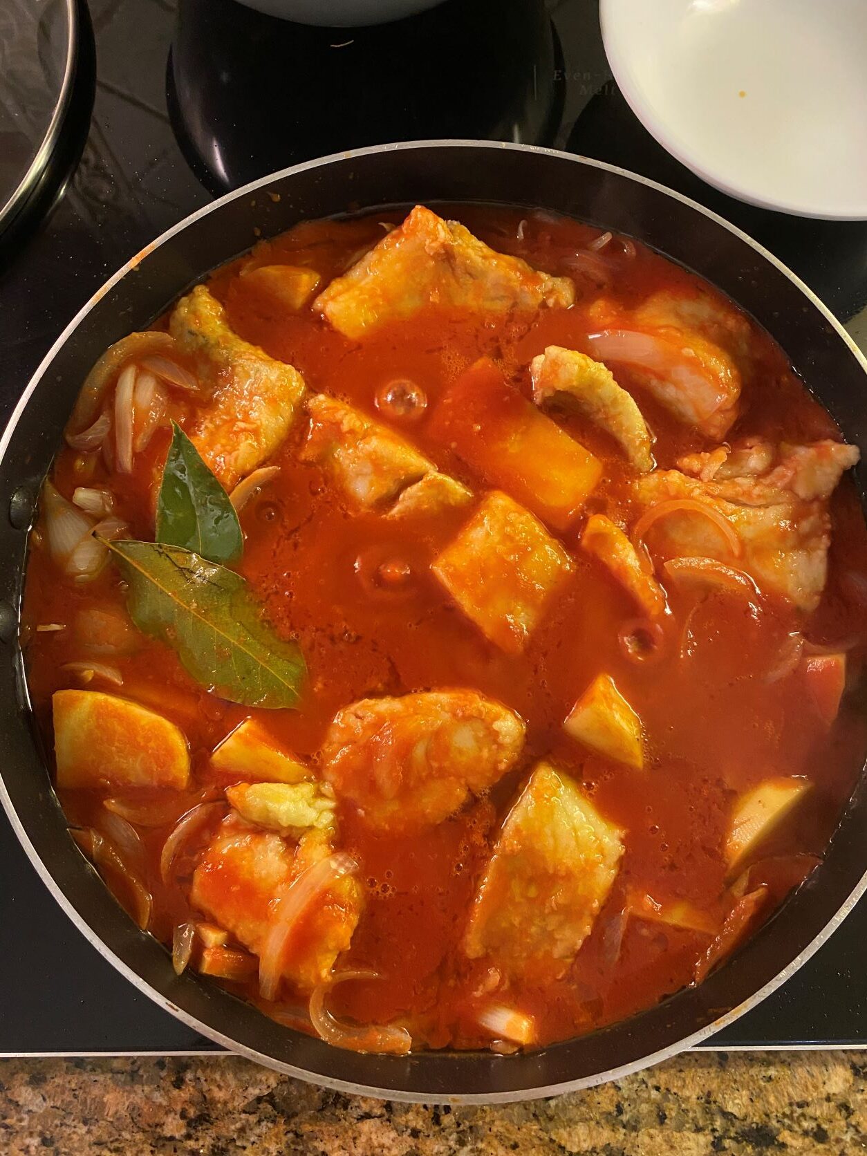 Salted Cod in Tomato Sauce in a large pot