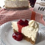 no bake cheesecake in a plate with cherry topping