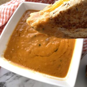 grilled cheese dipped in cherry tomato soup