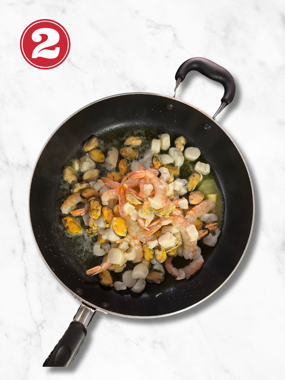 raw seafood in a pan