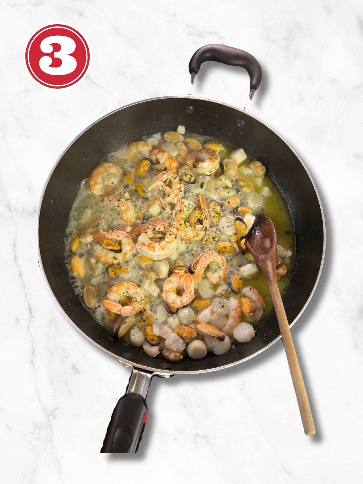 cooked seafood in a pan