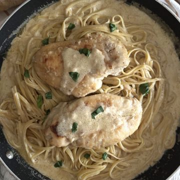 garlic parmesan chicken pasta in a skillet