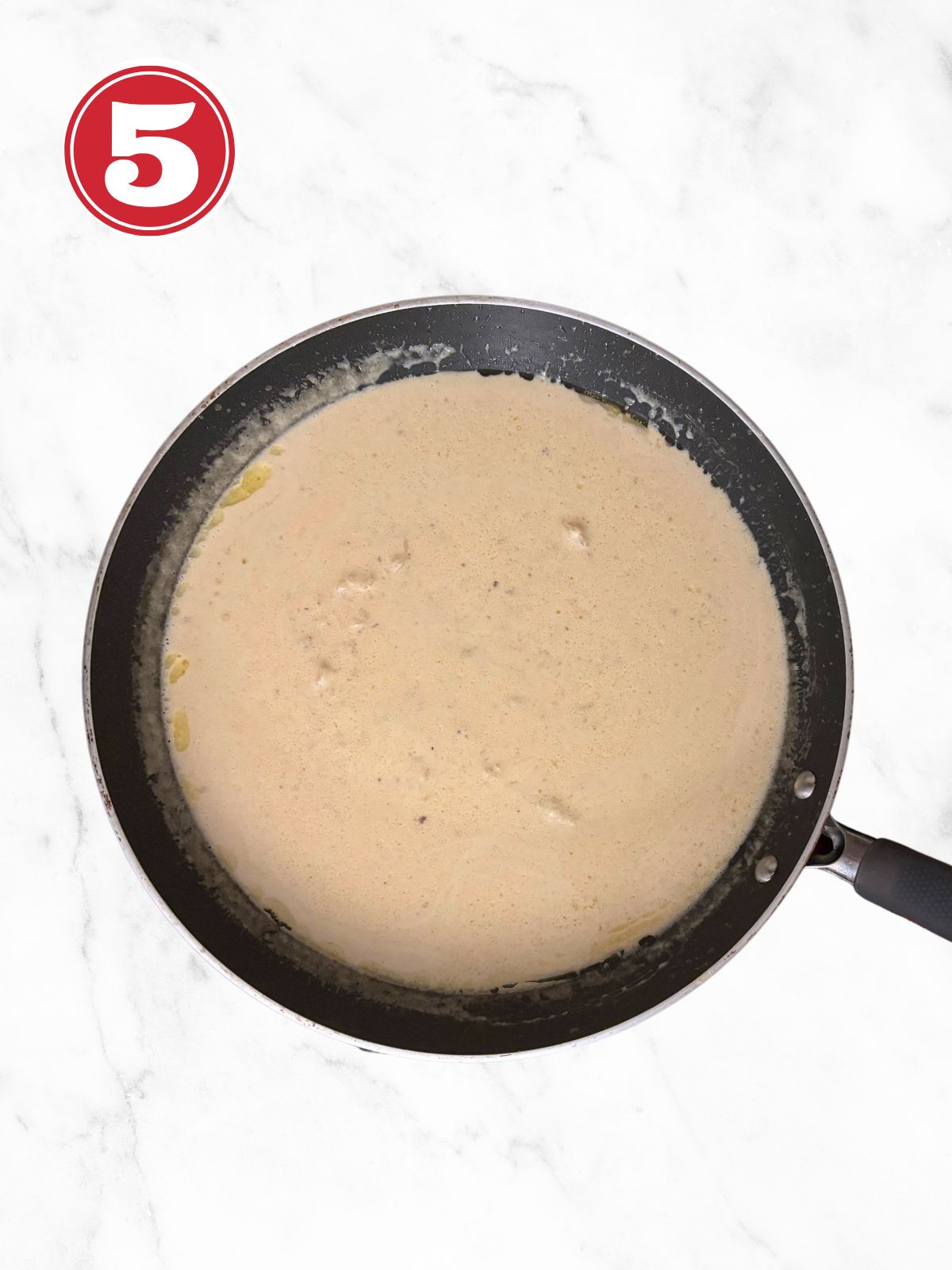 creamy garlic parmesan sauce in a skillet