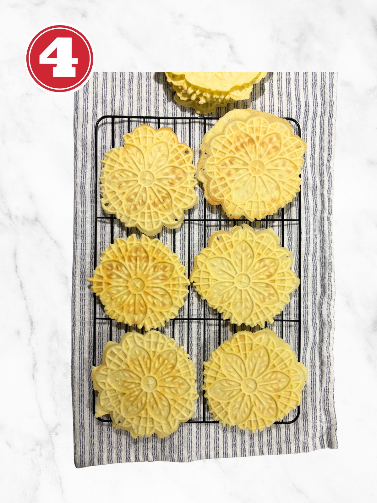 crisp pizzelle with anise on cooling rack