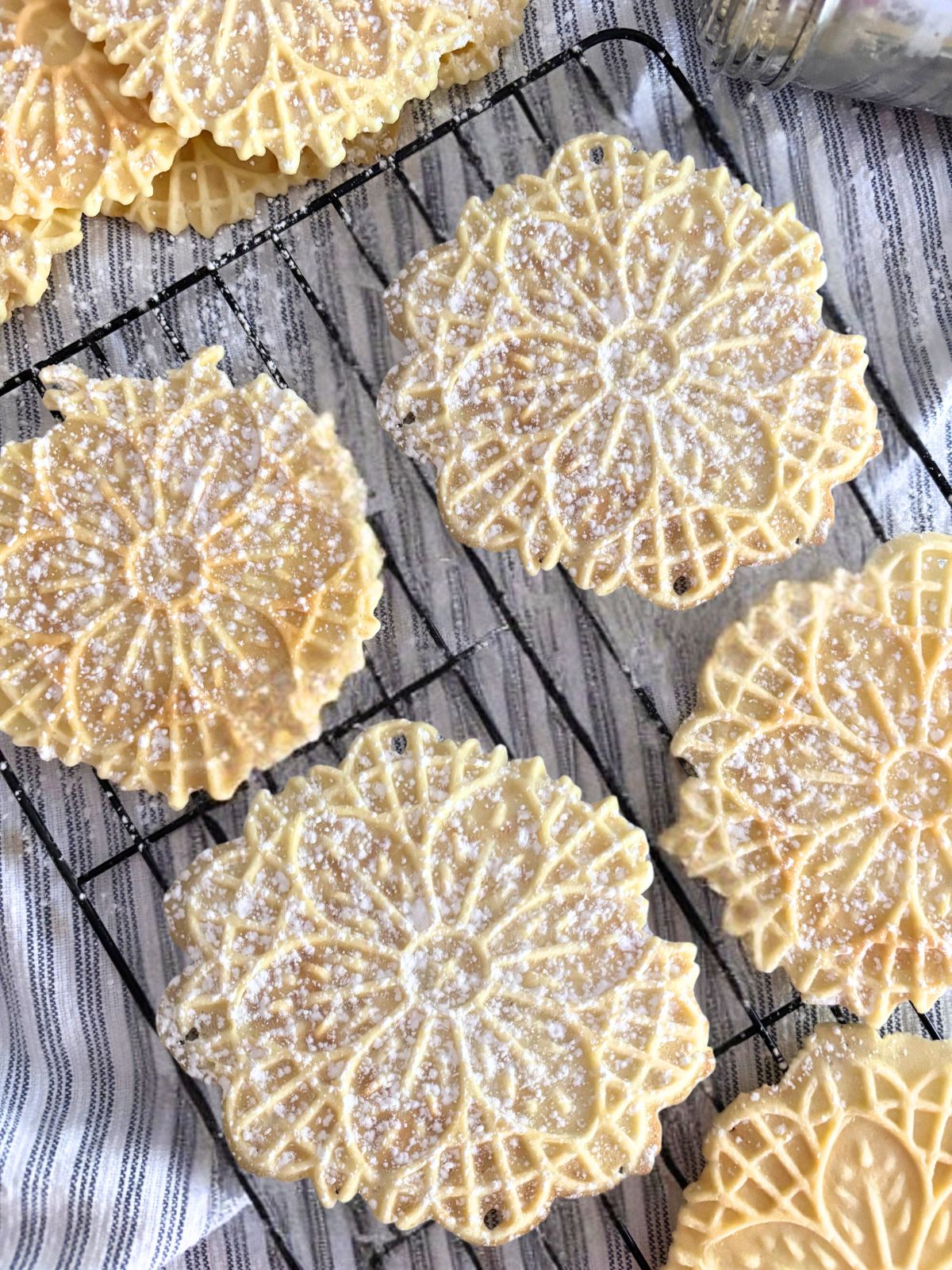Pizzelle cookies with anise on cooling rack