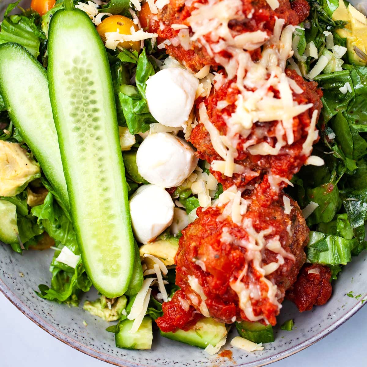 Italian Meatball Salad in a grey bowl