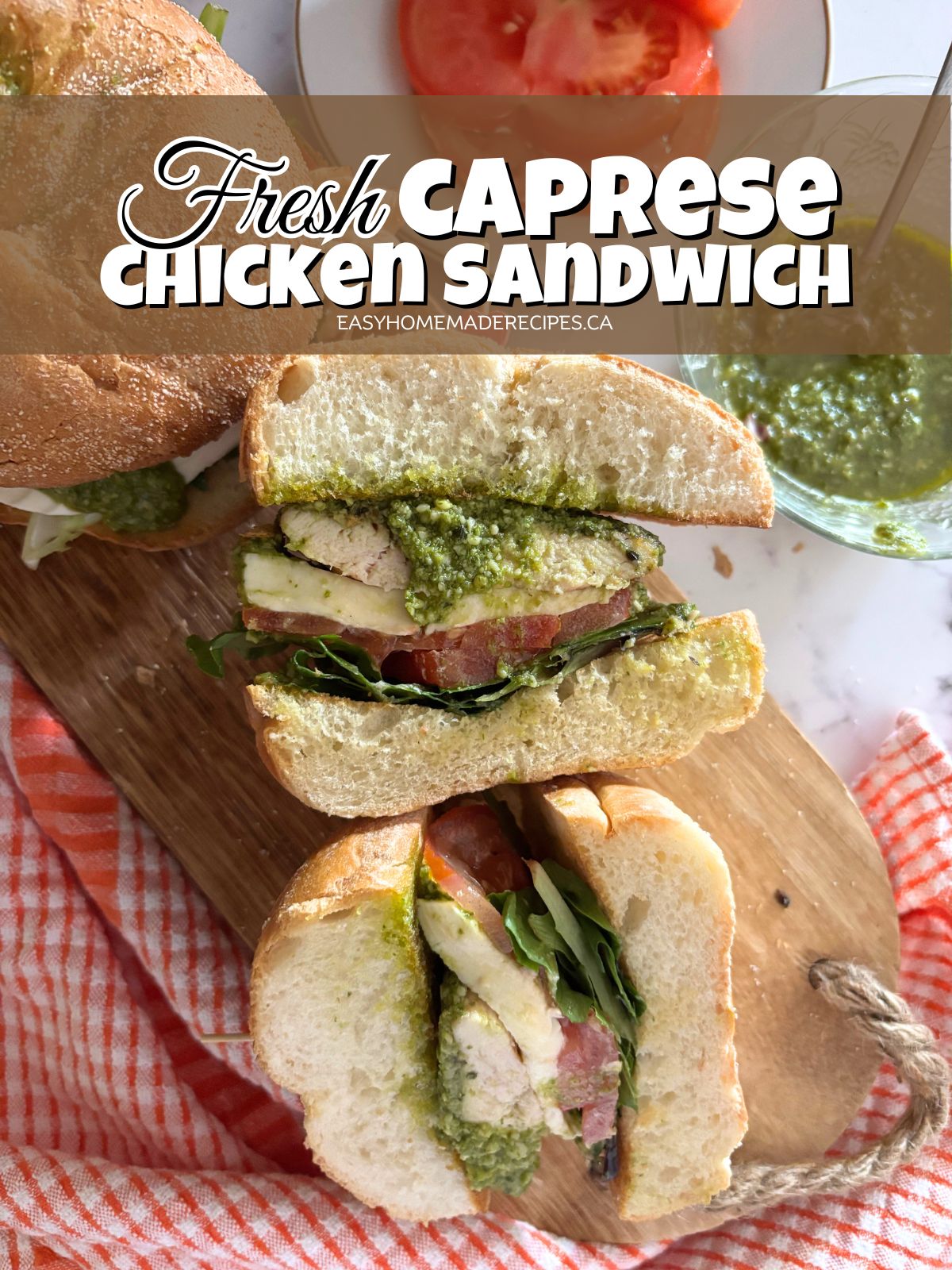 caprese chicken sandwich on a wooden cutting board PIN