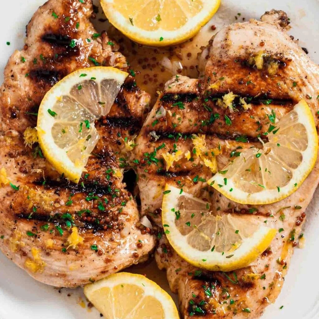 lemon grilled dijon chicken with lemon slices on top