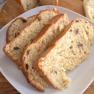 cut pieces of panettone in a white plate
