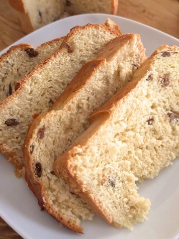 cut pieces of panettone in a white plate