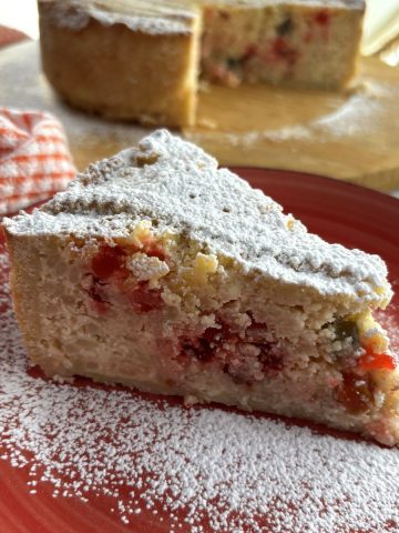 slice of Pastiera Napolitana in a red plate