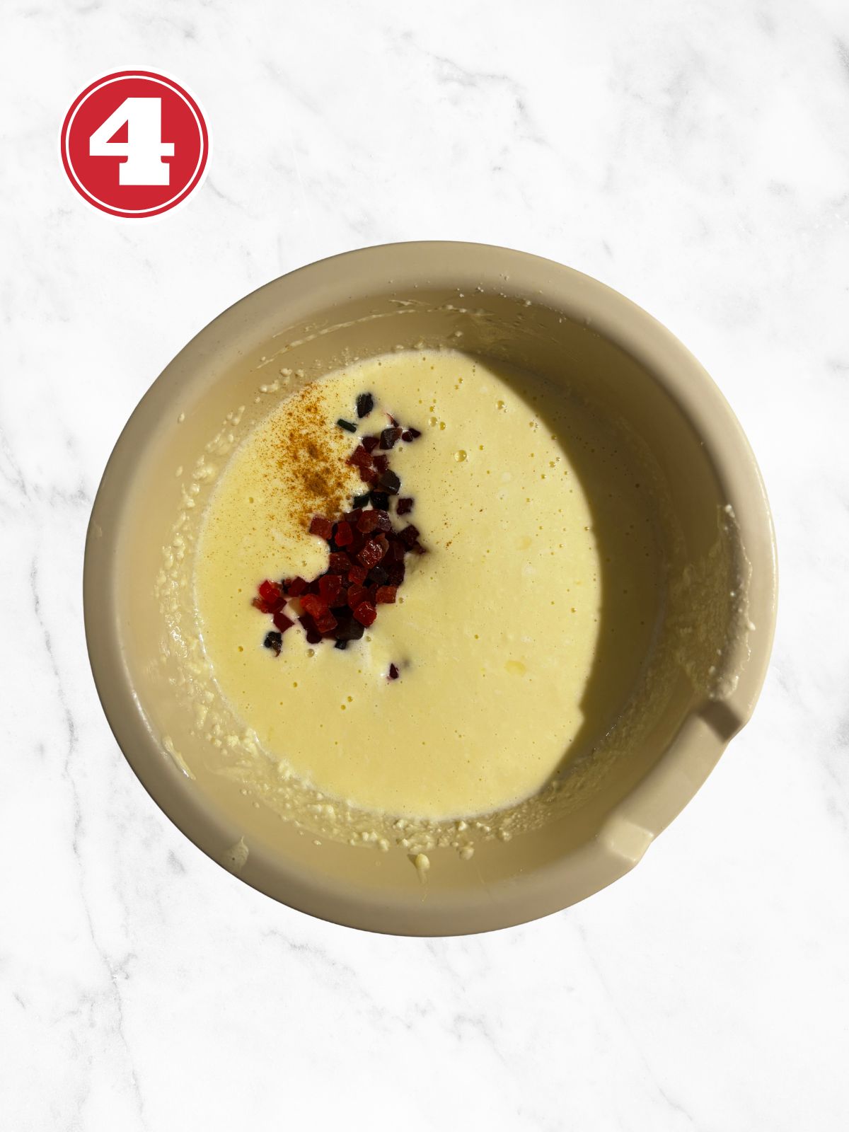 Whipped eggs and sugar with other ingredients and candied fruit