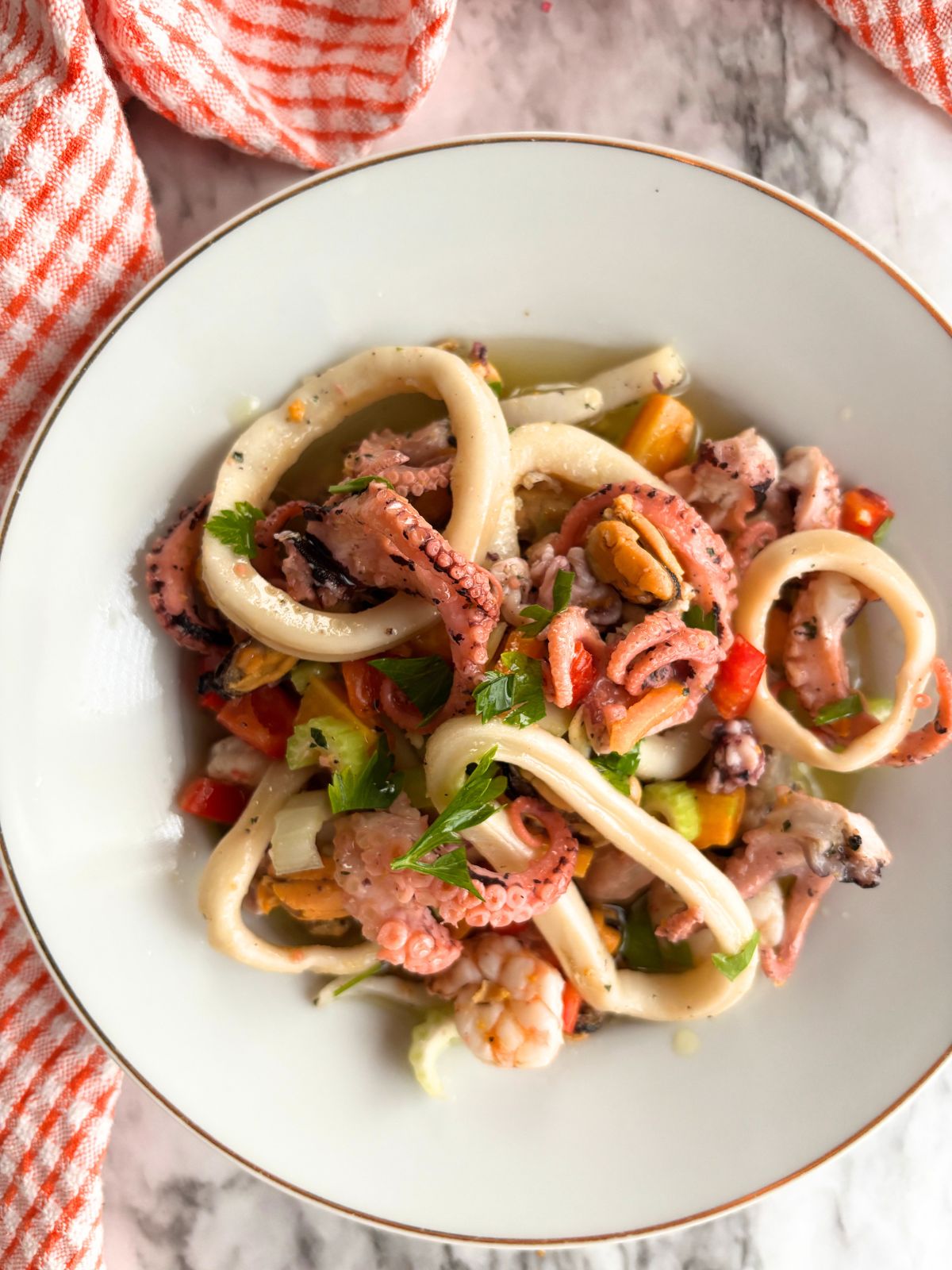 seafood salad in a white plate