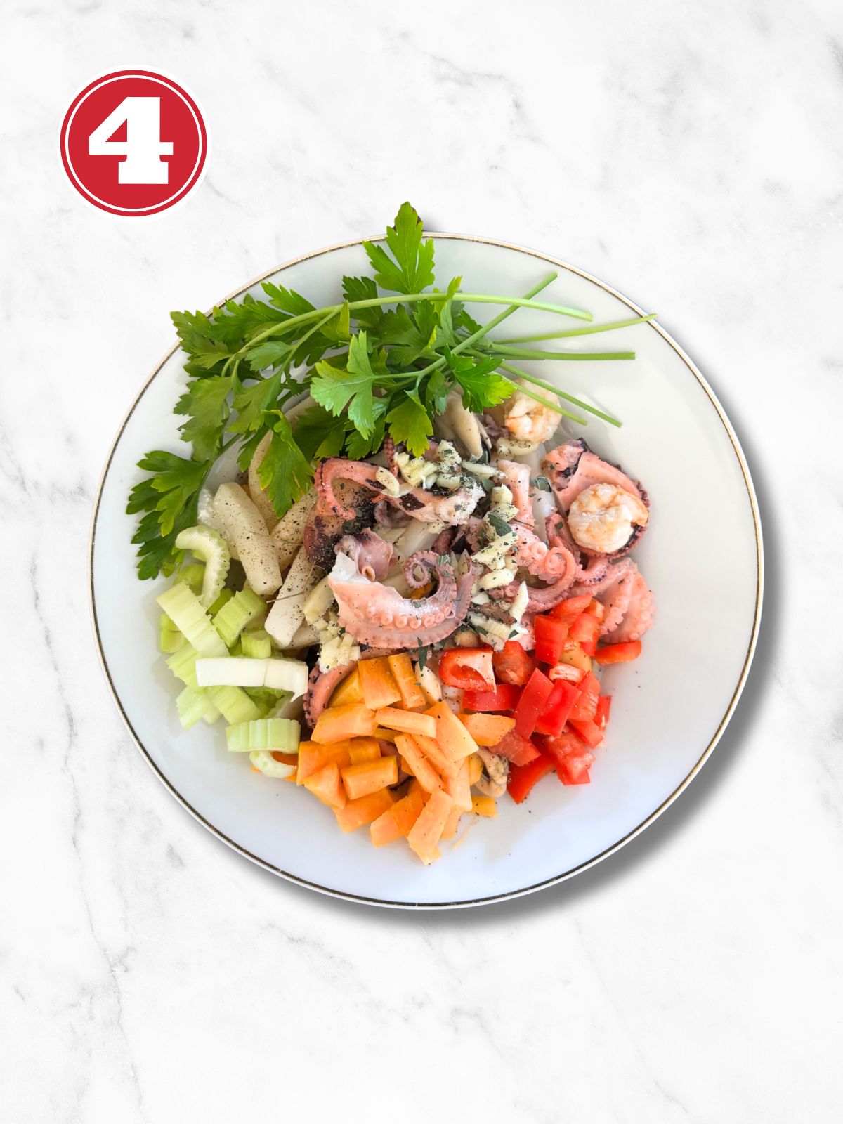 ingredients for seafood salad in a white plate